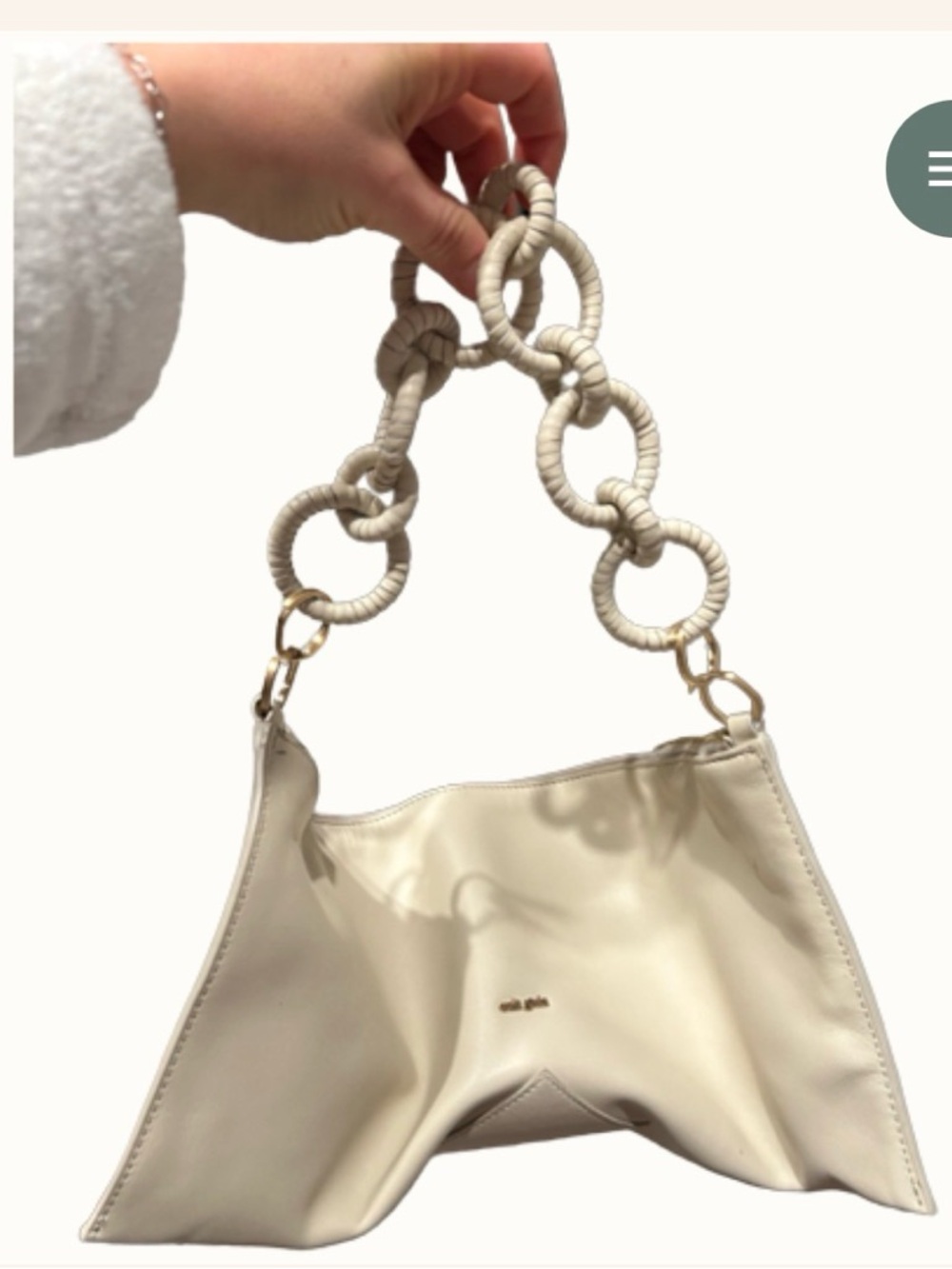 Cult Gaia off-white shoulder bag
White chain strap